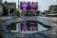 Maquillaje morado con dinero público: La sangría presupuestal que prioriza logos sobre baches